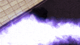 a person laying on the ground with a purple light coming out of their head