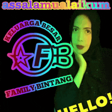 a woman in a black hijab is standing in front of a colorful logo that says keluarga besar