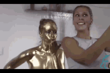 Gold Statue GIF - Gold Statue Petrification GIFs