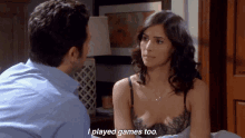 a man and a woman are looking at each other and the woman is saying i played games too