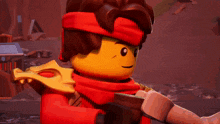 a close up of a lego character holding a sword with a surprised look on his face