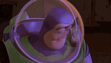 buzz lightyear from toy story is wearing a helmet with the word space ranger on it .