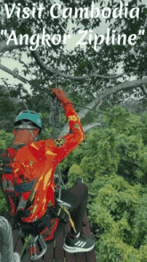 a man is riding a zipline in the jungle with the words visit cambodia " angkor zipline "