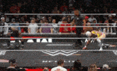 a wrestling ring with a sign that says netlix