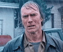 Rinsed Clint Eastwood GIF - Rinsed Clint Eastwood Raining GIFs