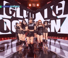 a group of girls are performing on a stage with the words comeback kiss of life in the background