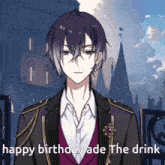 a man in a suit with the words happy birthday ade the drink behind him