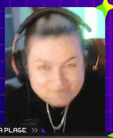 a woman wearing headphones and a necklace with the word plage on the bottom
