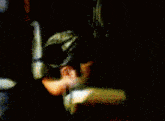 a blurred image of a bullet being fired in the dark