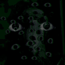a collage of images of a face with many eyes