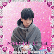 a picture of a young man with the name myungjae de emi written on it