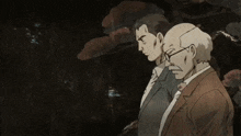 a bald man with glasses and a mustache looks at the camera
