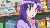 a girl with purple hair stands in front of boxes of potty