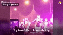 a group of people are dancing on a stage while holding hands .