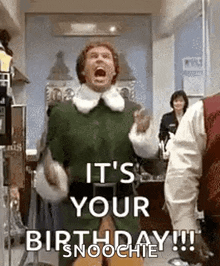 a man in a green elf costume is celebrating his birthday in a hospital room .