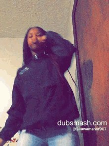 a picture of a girl with dubsmash.com on the bottom right