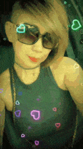 a woman wearing sunglasses and a choker with hearts around her neck