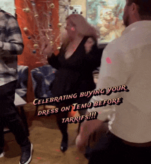a woman in a black dress is celebrating buying her dress on temu before taxes