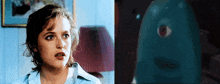 a woman in a blue shirt is next to a picture of a monster