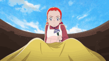 a young girl with red hair is holding a flower in her hand