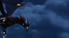 a dragon is flying through the air with blue lights coming out of it 's wings
