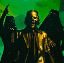 a man in a gold suit and mask is surrounded by angels