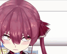 a close up of a girl 's face with red hair