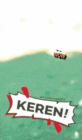 a woman with a wow sticker on her ear and a sign that says keren