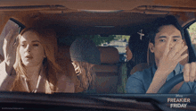 a group of people in a car with freakier friday written on the bottom right