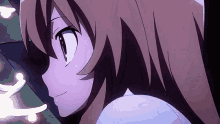 a close up of a girl 's face with a purple background .