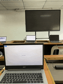 an acer laptop is open to a screen that says " exam completed "