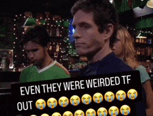 a man stands in front of a sign that says even they were weirded tf