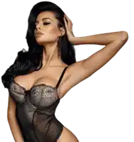 a woman wearing a black lace bodysuit and earrings holds her hand to her head