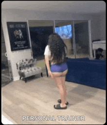 a woman in shorts is standing in a living room with a personal trainer written on the bottom