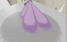 a computer generated image of a purple and blue snake