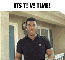 a man standing in front of a house with the words it 's t v time