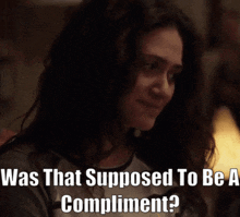 a picture of a woman with a caption that says was that supposed to be a compliment
