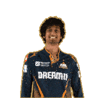 a man wearing a blue shirt that says ' rermi ' on it