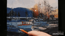 a painting of boats in a harbor is being made in animatica