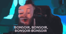 a man with a beard is sitting in a chair with the words bonsoir bonsoir bonsoir-bonsoir behind him