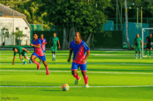 a group of soccer players are playing on a field with imgflip.com at the bottom of the screen
