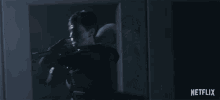 a blurred image of a person with a netflix logo behind them