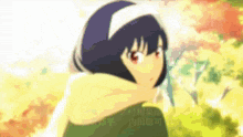 a blurry picture of a girl wearing a scarf and a headband