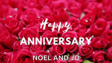 a bunch of red roses with the words `` happy anniversary noel and jo '' on them .