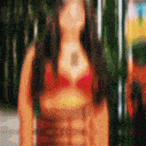 a blurred image of a woman in a red bra