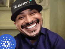 a man wearing a black hat that says multivers on it