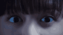 a close up of a person 's eyes with their eyes closed
