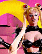 a close up of a woman wearing a costume that says 14yce tumblr on the bottom