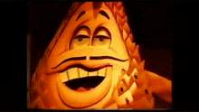 a close up of a cartoon character with a mustache and a big smile on his face .