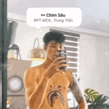 a shirtless man taking a picture of himself in a mirror with a speech bubble that says chim sau